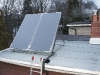 More flat plate solar panels on a Toronto roof